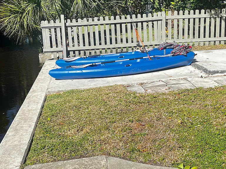 Kayaks,paddles,life jackets,and fishing gear