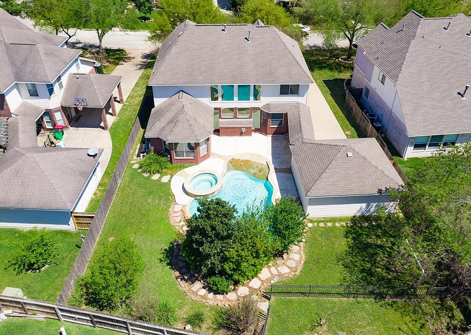 This home is located in Windrose, a golf course community, and comes complete with a beautiful pool and spa.