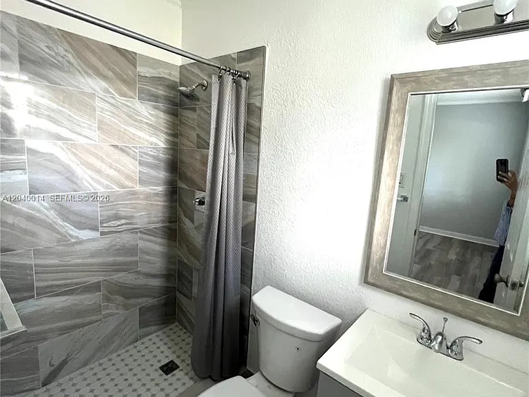 590 NW 40th Ct #3 — Photo 15