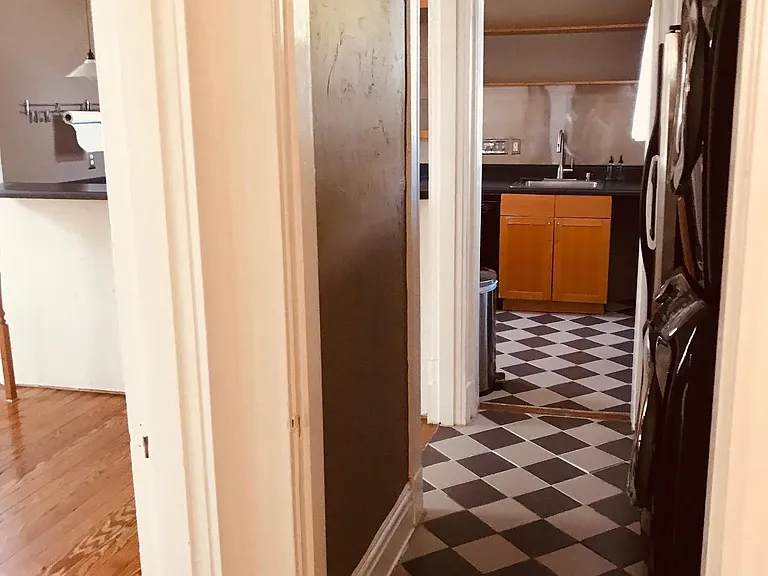 View from Hallway into Kitchen/Laundry Area