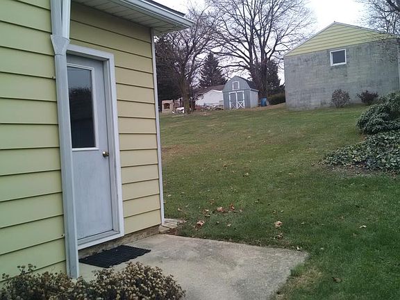Rear Entrance, Yard, Garage