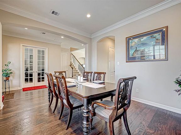 As you continue into the home, the formal dining room is on the right.
