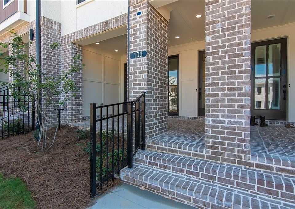 Covered patio with fenced in front yard. Stock photos used for demonstrational purposes.
