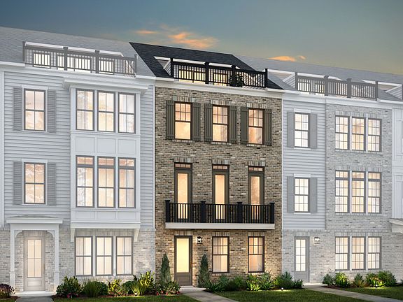 Bainbridge Exterior 28 features brick, terrace and 2 car rear load garage