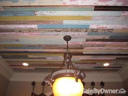 Our Dining Room Ceiling
						:
						This colorful ceiling is repurposed wood that was stripped from old barns.