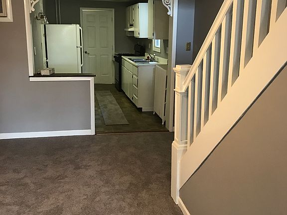 From Living Room: Dining Room to Kitchen