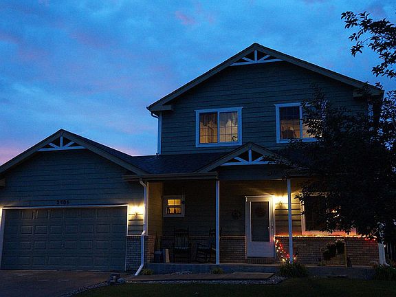 front of house at sunset
