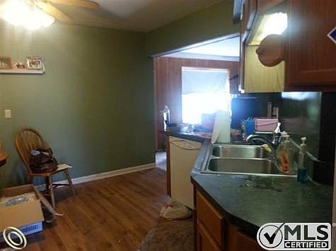 Kitchen opening to Family room