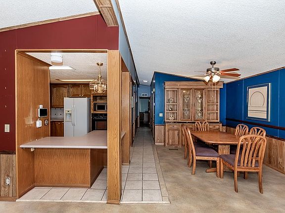 5th image of 11433 E 39th Pl