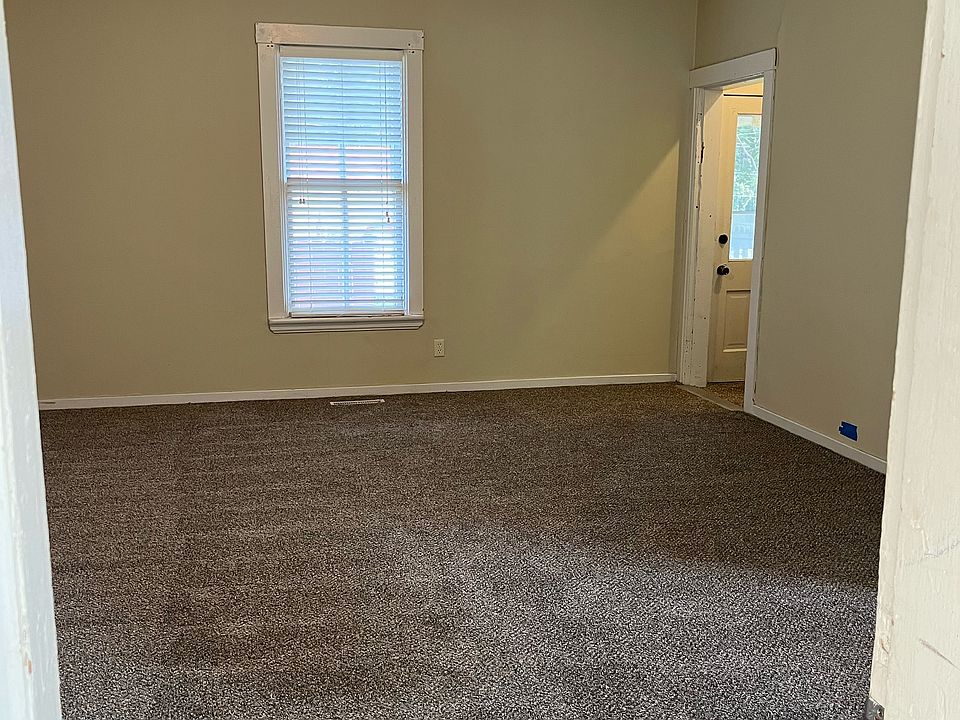 Spacious family room! New carpet throughout