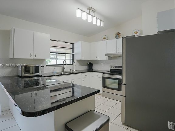 5th image of 10920 SW 143rd Ct
