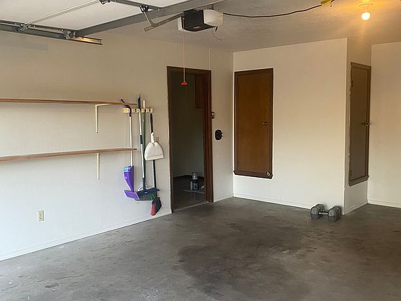 Two car garage, enter the home through the utility room