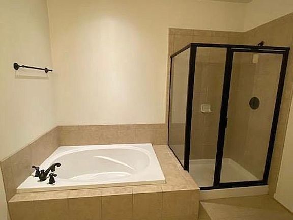 Master bath- double vanity and soaking tub/standing shower