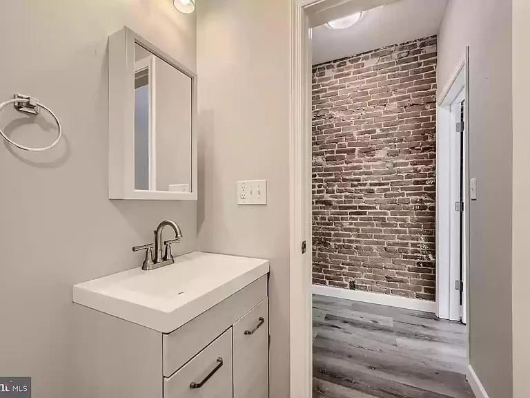 Full Bathroom (empty view prior to most recent tenant moving in)