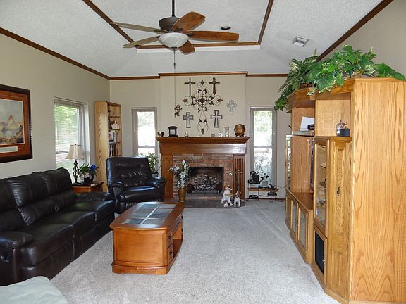 LR with vaulted ceiling & FP