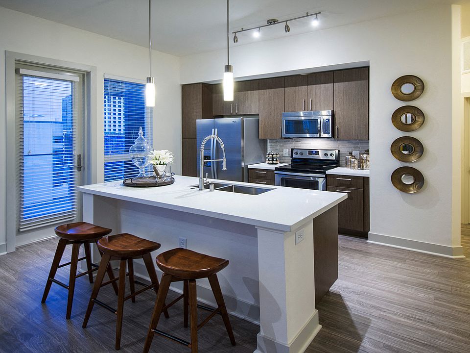 Custom cabinetry and large kitchen islands