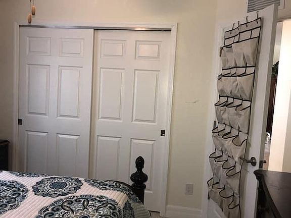 Roommate double closet and shoe holder.