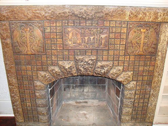 unique carved stone fireplace