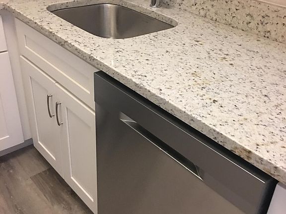 Kitchen with Granite tops with ample counter space