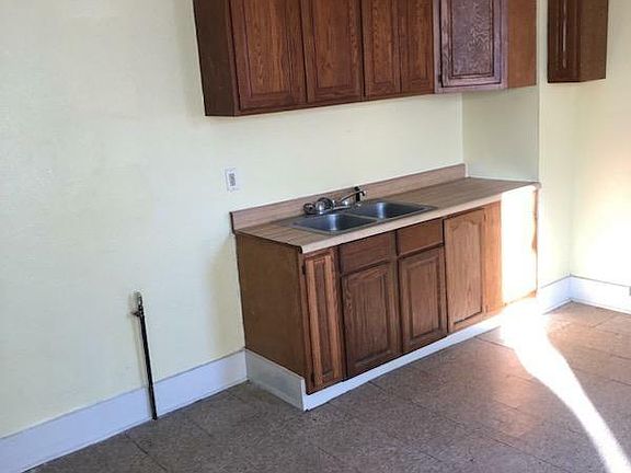 kitchen is large enough for eat in table