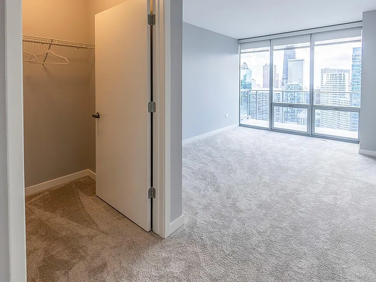 Envision your perfect bedroom with floor to ceiling cityscape views