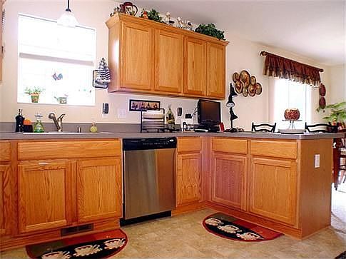 Kitchen has Beautiful Wood Cabinets