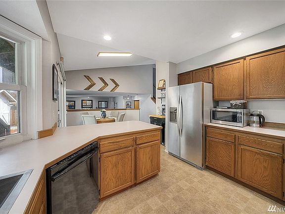 Spacious kitchen with great countertop space and ample cupboards for storage. 