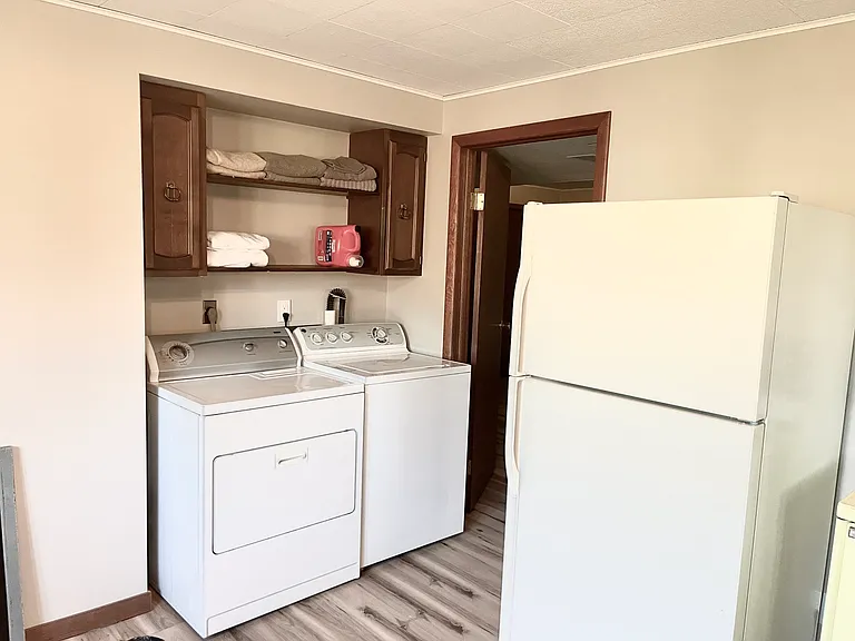 Laundry area - combined with second kitchen on the lower level.