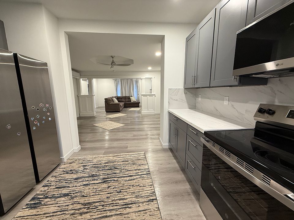 kitchen opening to dining room and at the end its the living room