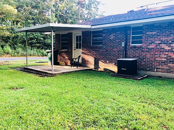 Covered patio located on back side of apartment.