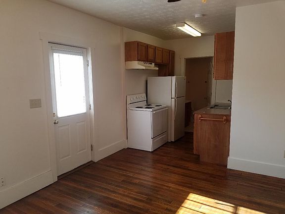 Kitchen & Bath Behind Kitchen