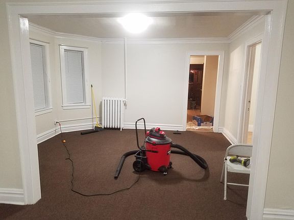 view from living room to dining room with kitchen /pantry/ba