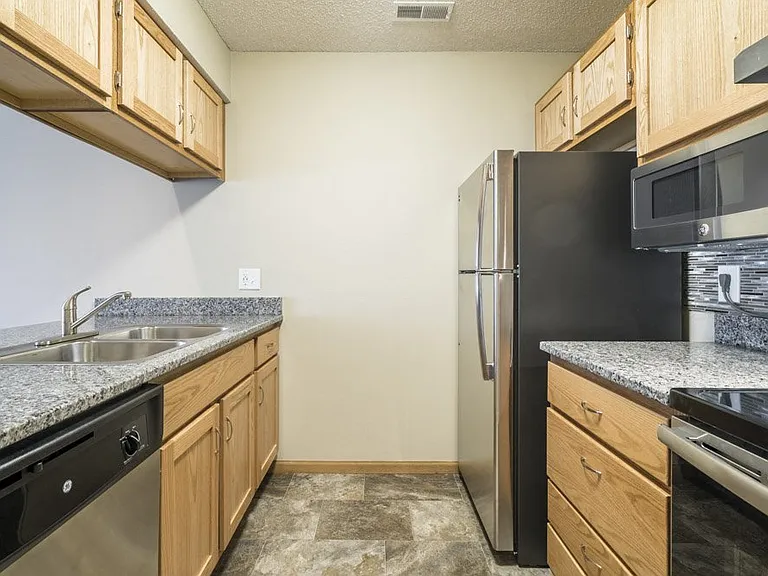 Our renovated homes feature beautiful updated counters, cabinets, and stainless appliances.