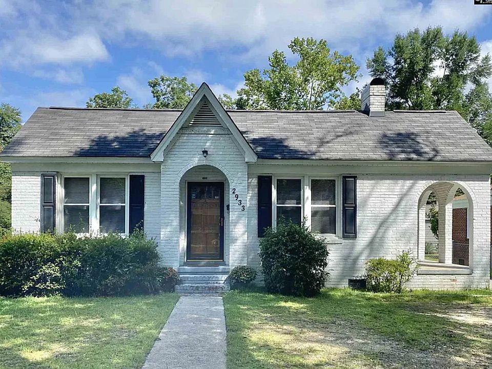 freshly painted exterior with lovely side porch!