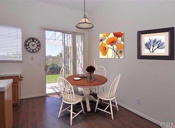 This photo shows the breakfast area virtually staged.