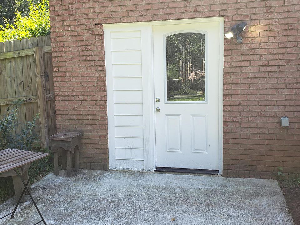 Front Door. Sittinng area and security light.