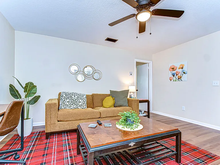 Spacious living room area with a pull out queen bed in the couch