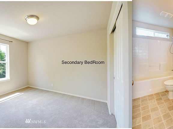 secondary bedroom with a bathroom outside of the room