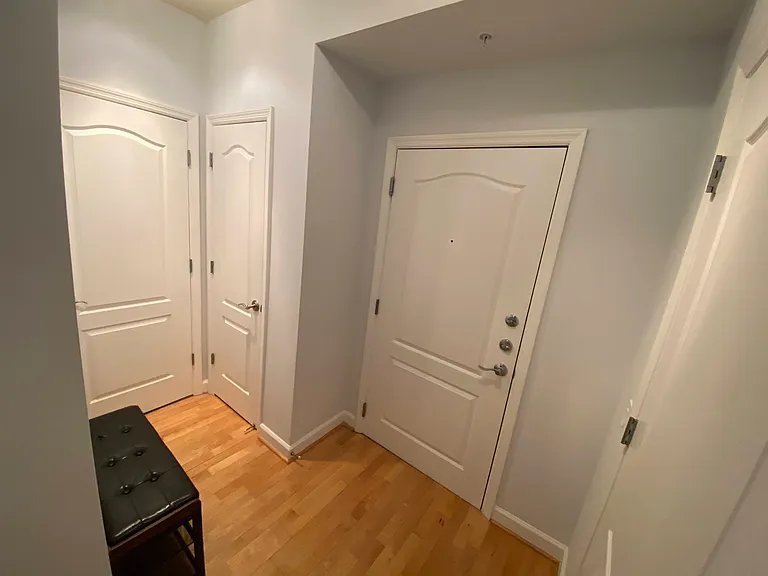 Front door welcome area with an area to take off your shoes.