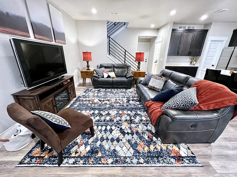 Large living area with Cable TV, 4 recliners in couches and 4 USB ports!