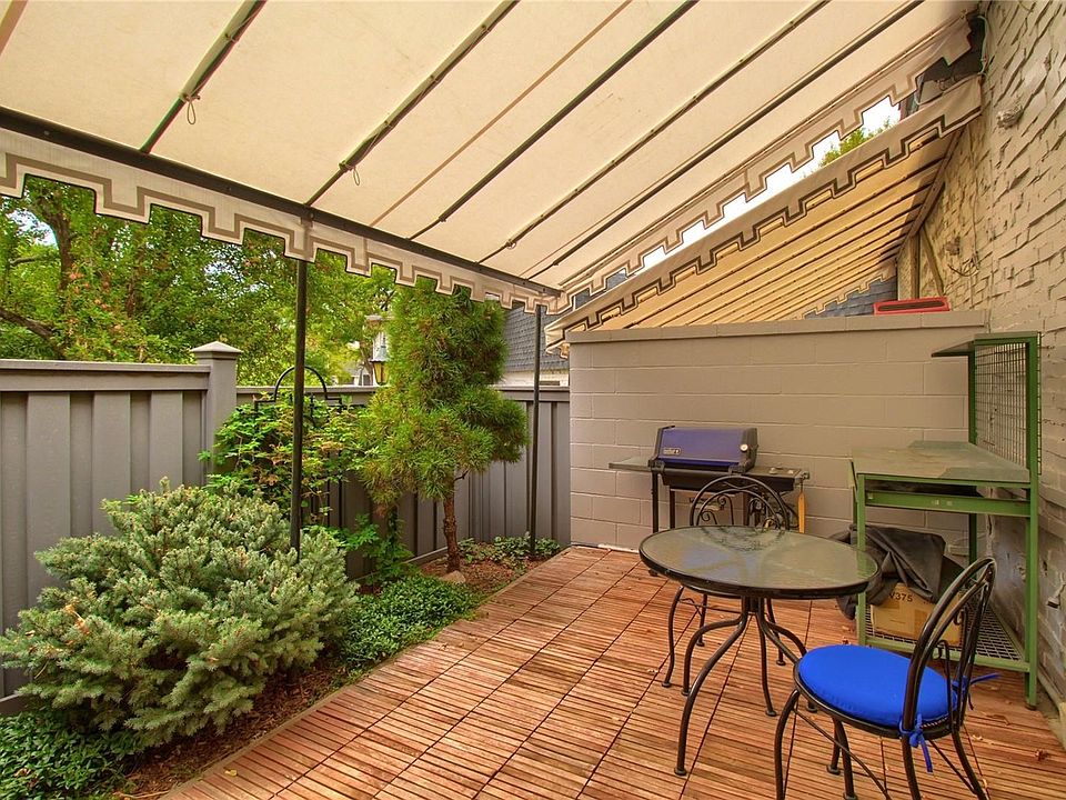 WELCOME HOME to your inviting patio with grill and table for two!