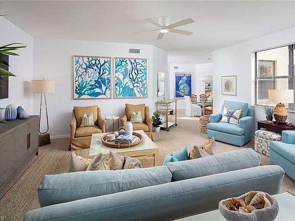 5th image of 7040 Pelican Bay BLVD #D-303