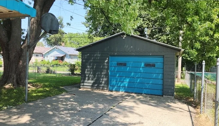Garage and fenced back yard.