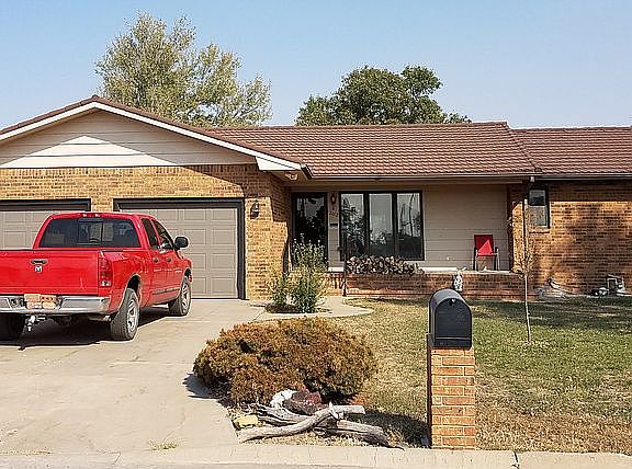  2 car garage, sitting porch