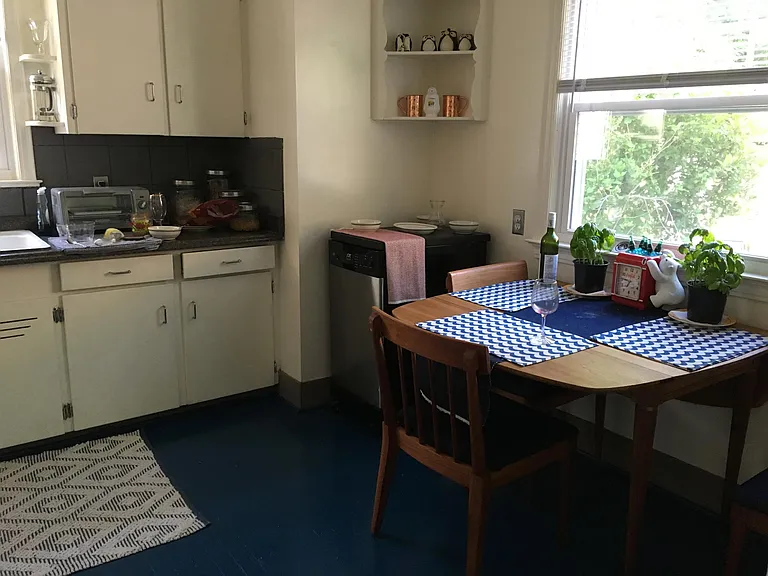 Kitchen, floor is now clear hardwood.
