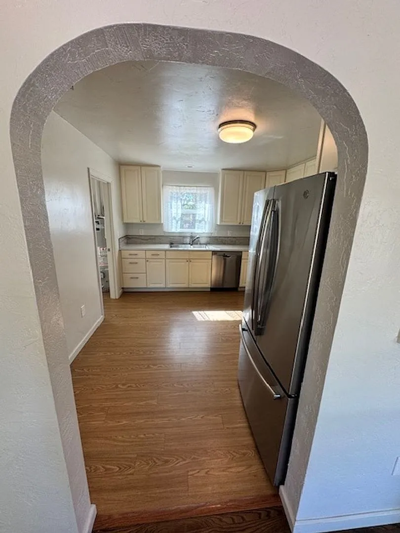 Charming Updated 4-Bedroom Home in the Garden Tract Hardwood Floors, Central Air, 2-Car Garage + ... — Photo 4