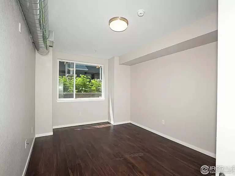 Large Bedroom with Back Courtyard View