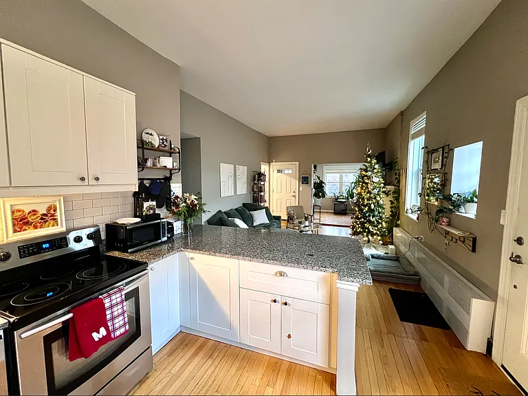 open kitchen layout into living area 
 - christmas tree not included ;)