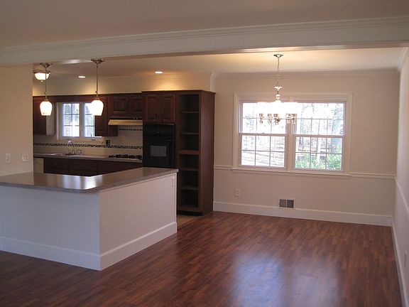 living area looking into dining area/ kitchen