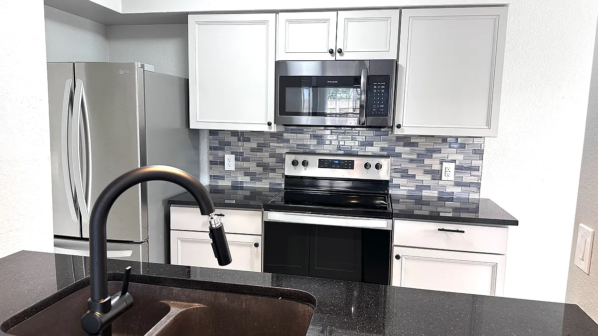 Building Photo - 7202 Mansions Dr #J3-1